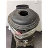 Image 3 : Cast iron pot belly stove from the "Motherland" show