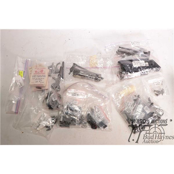 Selection of Ruger parts springs, grips, bolts, triggers, pins, pawls, screws etc