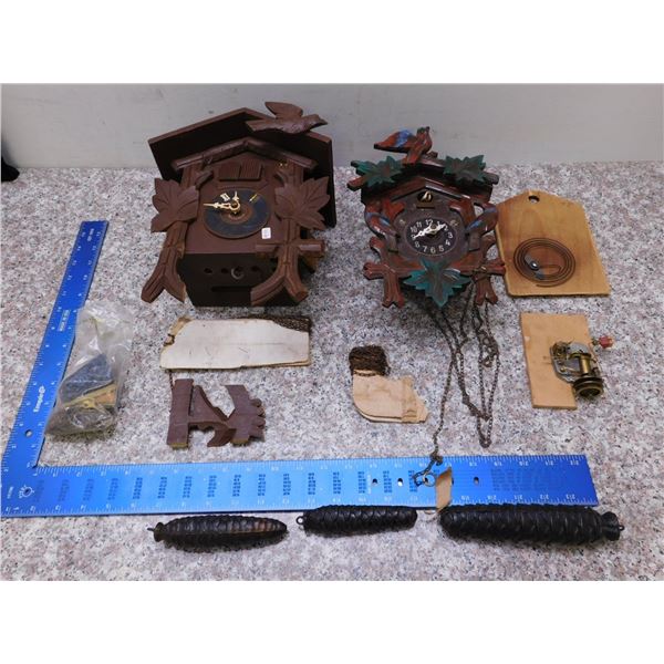 Lot of 2 Cuckoo Clocks some Damage As Is with Pendulum Weights