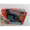 Image 2 : Thomas the train toy and assorted kids books