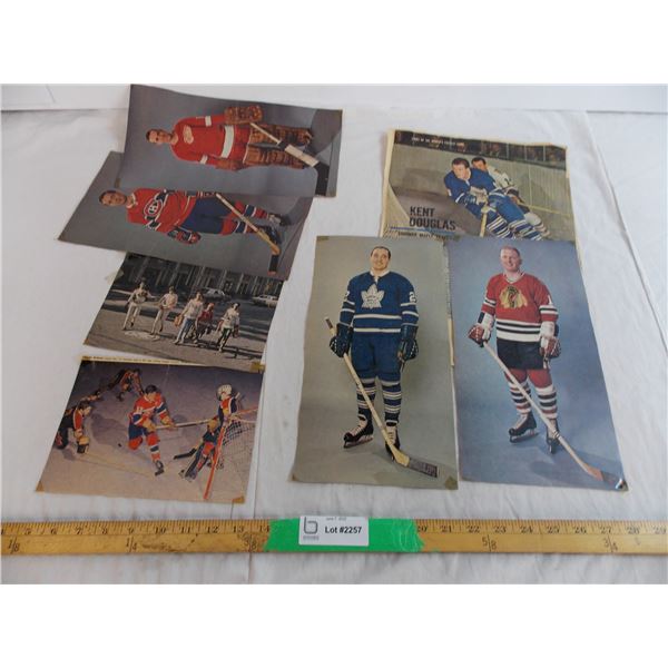 Various newspaper clippings of hockey players