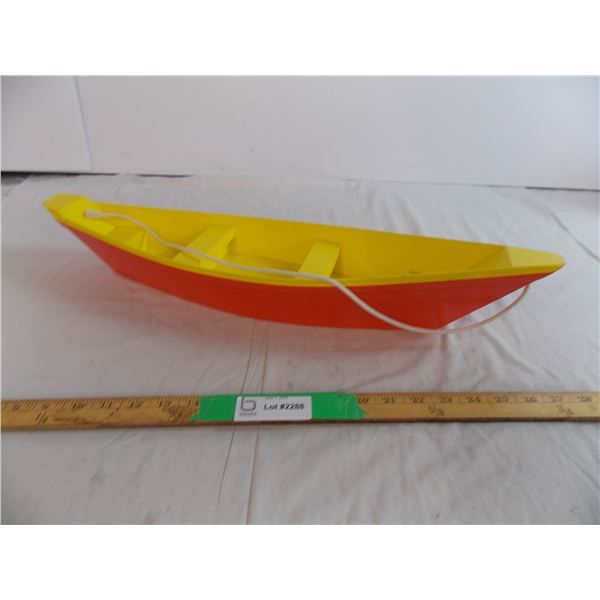 Wooden boat on string 24" long