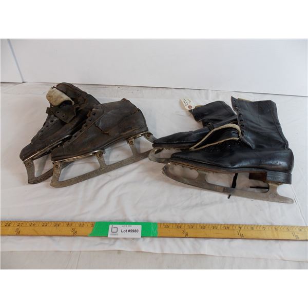 No 197 mercury mens figure skates with another pair