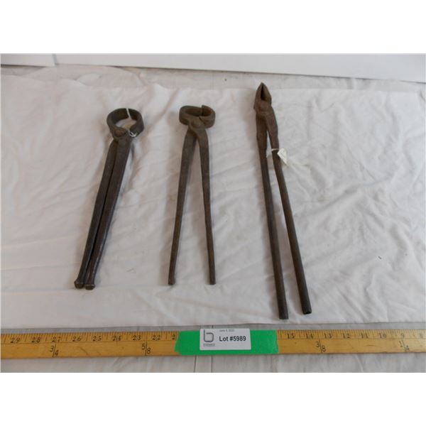 (3) different blacksmith tools