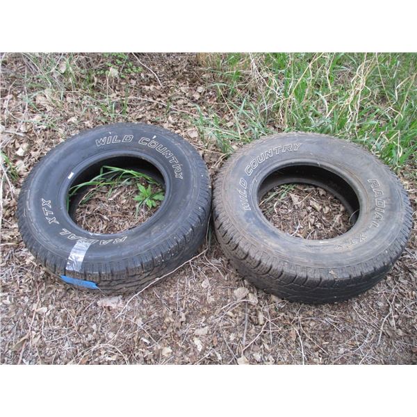 (2) wild country tires - 235 75R15