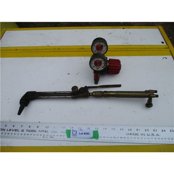 Torch head with acetylene gauges