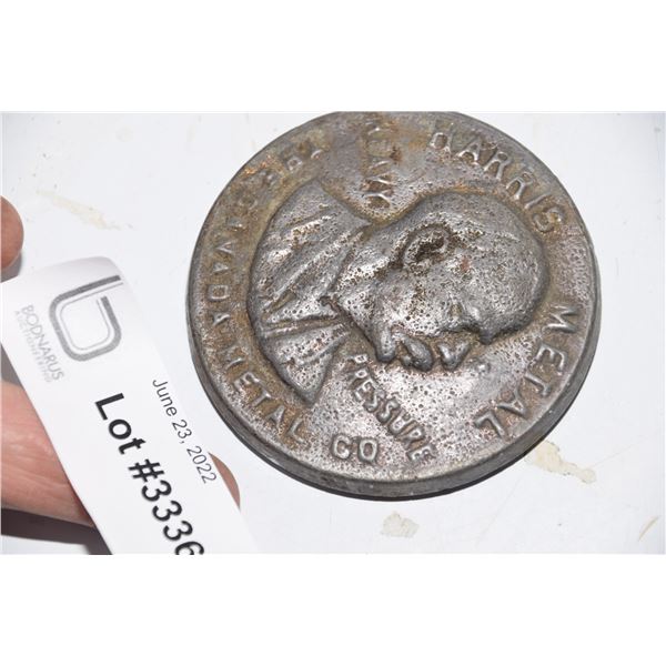 Harris metal paperweight