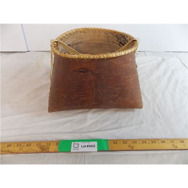 Birch bark container with leather handle made in Northern Saskatchewan