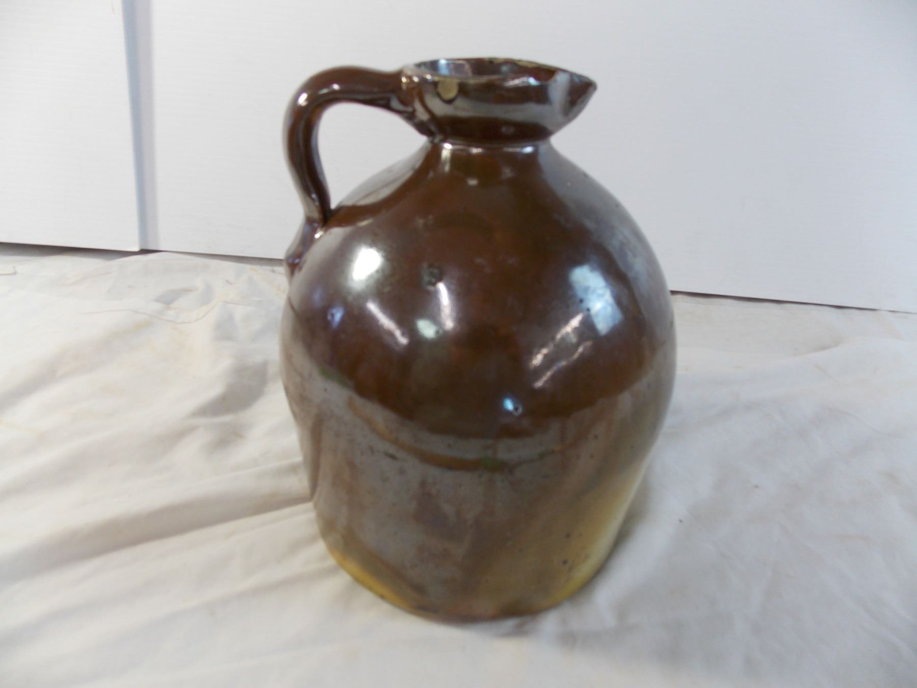 Vintage Stoneware Molasses Jug chipped at top