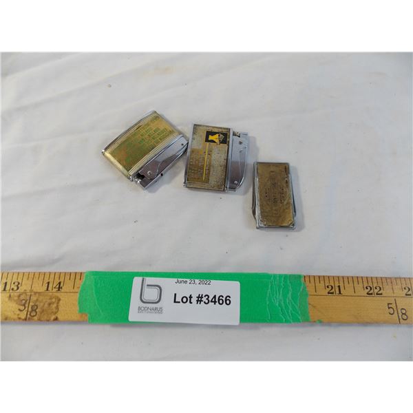 Precision Oil Field Service and Yellowhead construction lighters with money clip