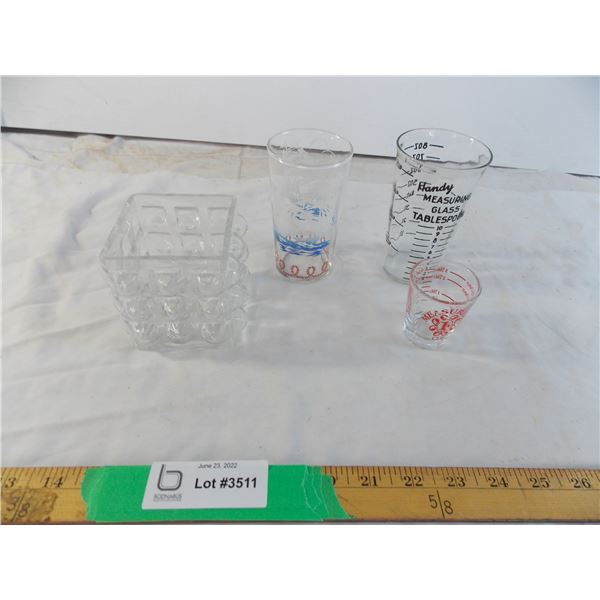 Assorted glass measuring cups and square glasses