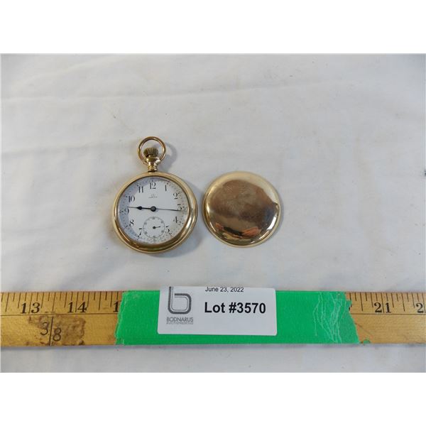 Omega gold pocket watch signed "G.F Bosomworth Manor sask " - in good working order