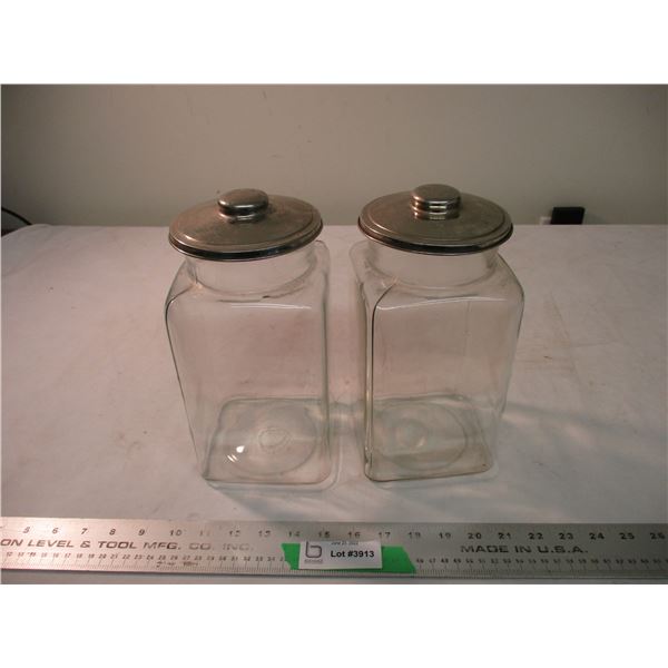(2) Glass storage jars with lids