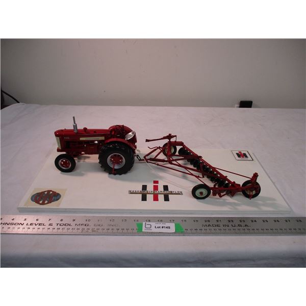 International W450 tractor with custom built display No 10 Harrow plow - 24x10.5