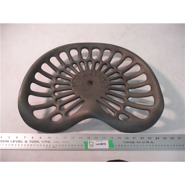Deering cast iron tractor seat