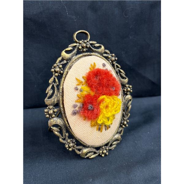 Antique needle work in frame