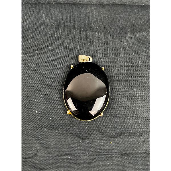 1 1/4" large black oval pedant