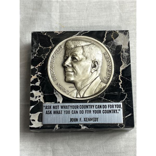 J.F.K. memorial medal set in marble