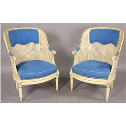 PAIR CARVED PANTED CANE BERGERES CHAIRS