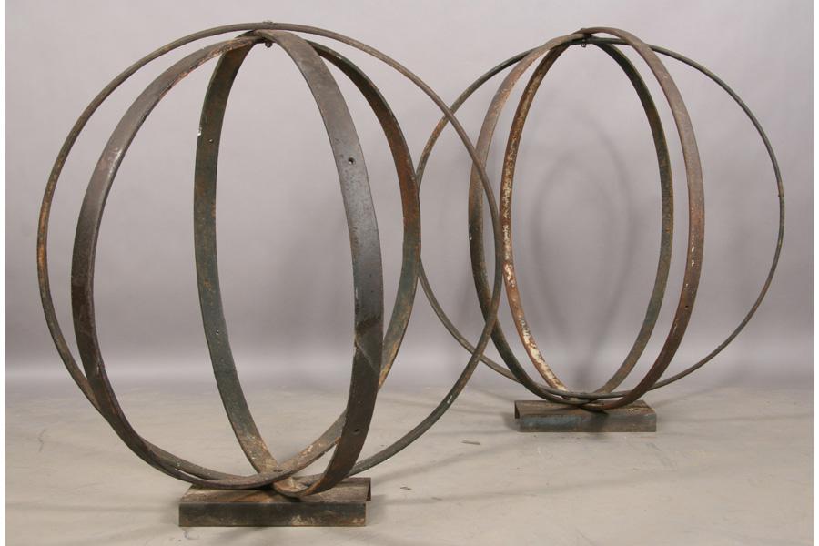 Two antique iron rings sculptural spheres