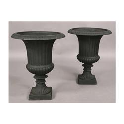 Pair of cast iron garden urns with flute