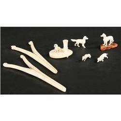A lot of seven pieces of carved ivory.