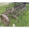 Image 2 : VINTAGE SPRING TOOTH CULTIVATOR ON STEEL WHEELS - 8 FOOT