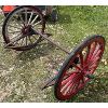 Image 2 : AXLE W/ WOOD SPOKED WHEELS - 26 INCH DIAMETER