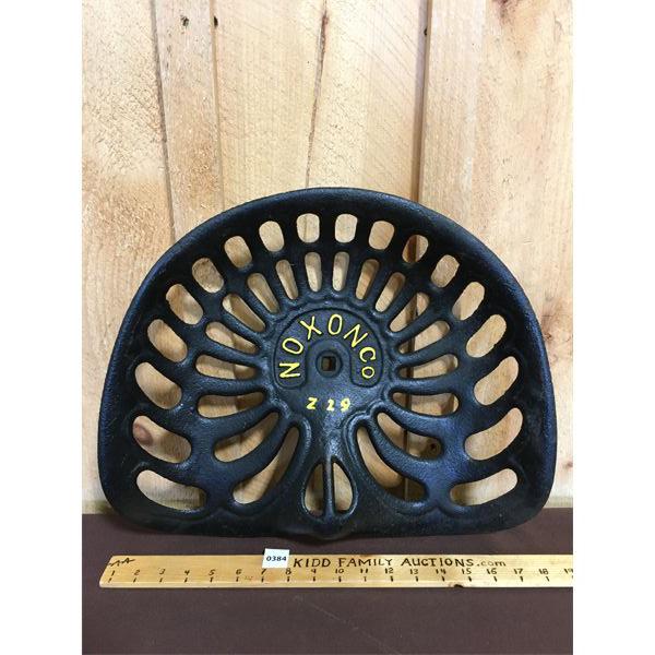 NOXON CO CAST IRON IMPLEMENT SEAT