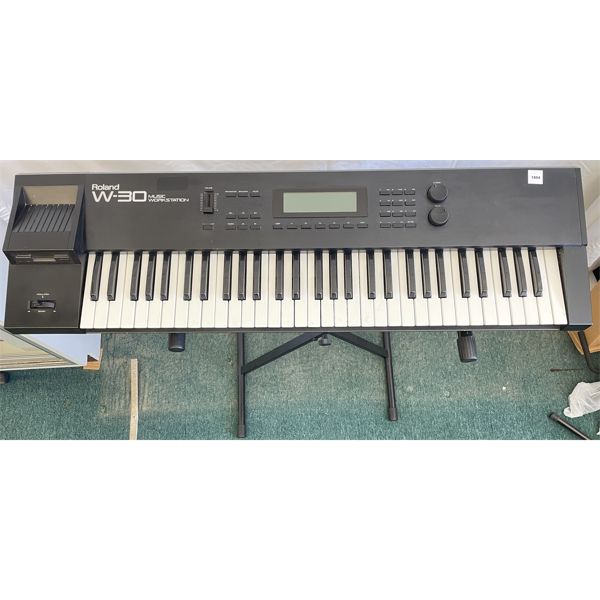 ROLAND SYNTHESIZER W/ CARDS, MANUAL, POWER CORD