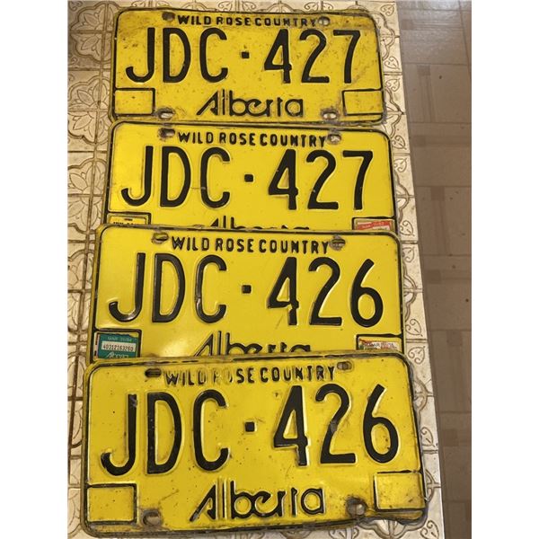 Alberta License Plates , Yellow "Wild Rose Country"