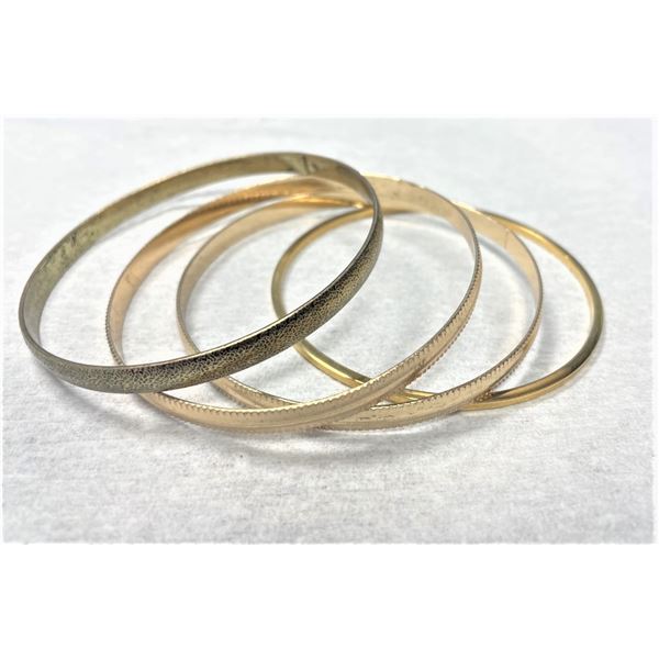 Four bangle bracelets