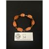 Image 1 : Genuine Gold Stone Carved Beads With Glass SpacersStretch Bracelet.