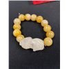 Image 2 : Jadeite Bead Stretch Bracelet with a White Jadeite Carved Dog Centerpiece. Beads Measure 12mm Round 