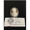 Image 1 : Lady's Sterling Silver Shell Cameo. Art Nouveau Brooch. Circa 1890. Bezel-Set is one Higly Domed Oca