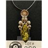 Image 2 : .925 Sterling Silver with Greenish Genuine Amber Pendant with Black Cord