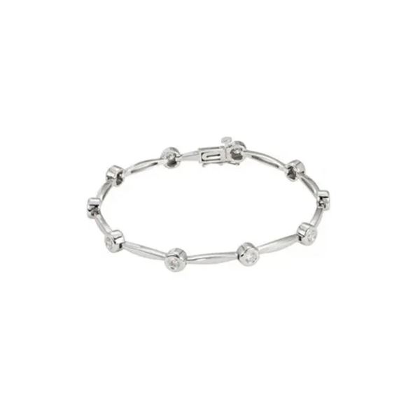 Beautiful ladies 14 karat white gold and diamond line bracelet