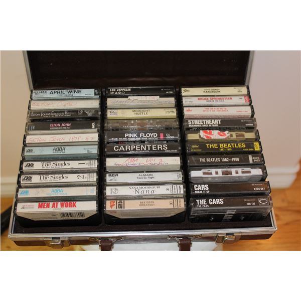 30 cassette tapes with case.  Popular names. Easy Listing to Rock n Roll.