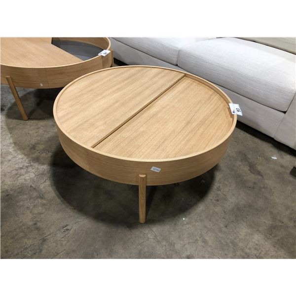 WOUD ASH 36"W ROUND SLIDING STORAGE COFFEE TABLE