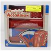 Image 1 : LITTLE RED ACCORDION NEW IN BOX