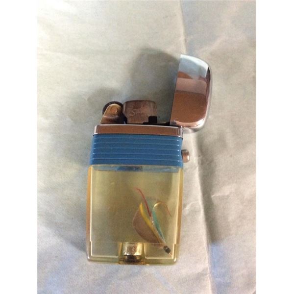 SCIPTO Inc. vintage lighter with fly fishing lure