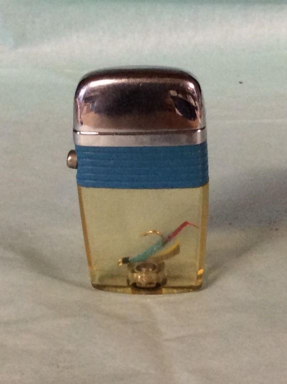 SCIPTO Inc. vintage lighter with fly fishing lure