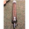 Image 1 : Plexiglass cylinder coffee bean dispenser filled with coffee beans from the Blockbuster partial anim
