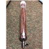 Image 1 : Plexiglass cylinder coffee bean dispenser filled with coffee beans from the Blockbuster partial anim