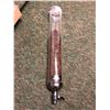 Image 1 : Plexiglass cylinder coffee bean dispenser filled with coffee beans from the Blockbuster partial anim