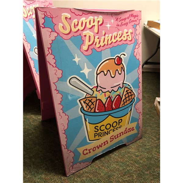 "Scoop Princess" sandwich board advertisement sign from the Blockbuster partial animated movie - app