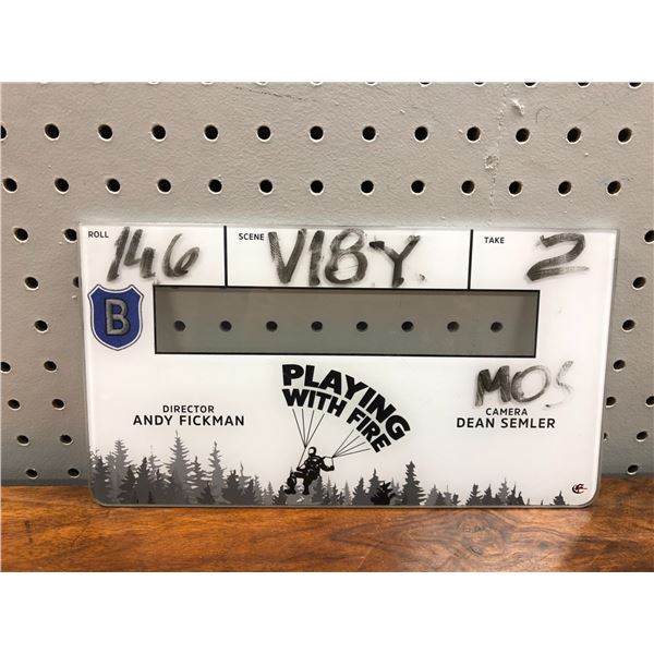 Plexiglass movie production company scene take board from "Playing with Fire"