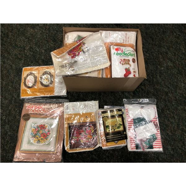 Box full of assorted vintage needlepoint patterns (NOS - new old stock)