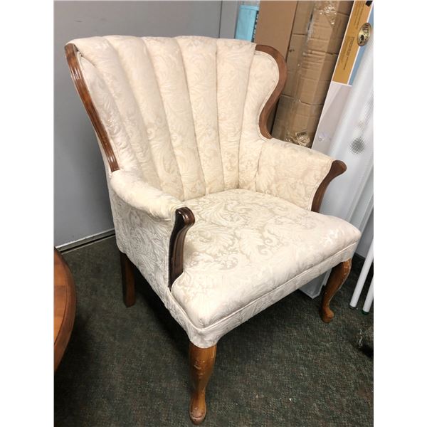 French Provincial scallop back upholstered armchair