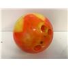 Image 1 : "Motherland: Fort Salem" - Fluorescent orange & yellow faux bowling ball